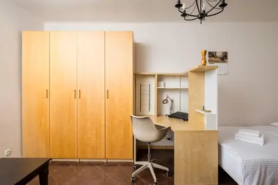 Łóżko lub łóżka w pokoju w obiekcie Ochota Częstochowska Comfy Studio by BookingHost