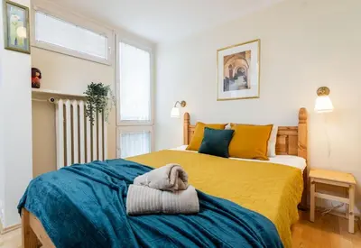 Łóżko lub łóżka w pokoju w obiekcie Classic Apartment Grzybowska