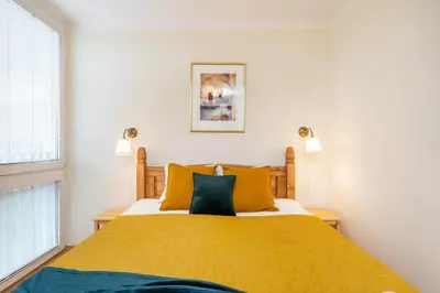 Łóżko lub łóżka w pokoju w obiekcie Classic Apartment Grzybowska