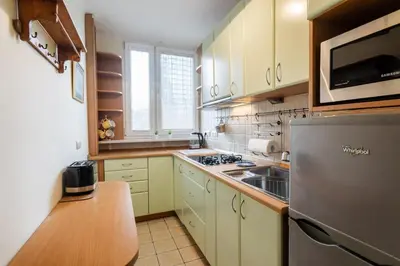 Kuchnia lub aneks kuchenny w obiekcie Classic Apartment Grzybowska