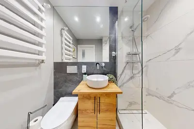 Łazienka w obiekcie Mango Apartment City Center Wspolna