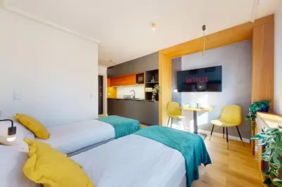 Telewizja i/lub zestaw kina domowego w obiekcie Mango Apartment City Center Wspolna
