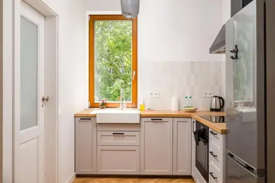 Kuchnia lub aneks kuchenny w obiekcie Praga Łochowska Deluxe Apartment by BookingHost