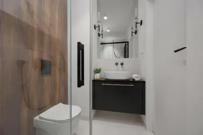 Łazienka w obiekcie Modern Studio in Wola with Air Conditioning by Noclegi Renters