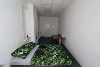 Łóżko lub łóżka w pokoju w obiekcie Fantastic-Inn Warszawa - FMG