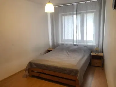 Łóżko lub łóżka w pokoju w obiekcie Studio Puławska