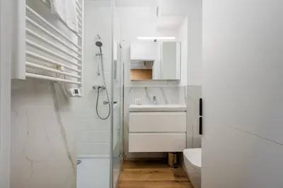 Łazienka w obiekcie Praga Bliska Modern Apartment by BookingHost