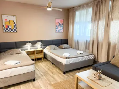 Łóżko lub łóżka w pokoju w obiekcie Easy Stay Studio #self check-in