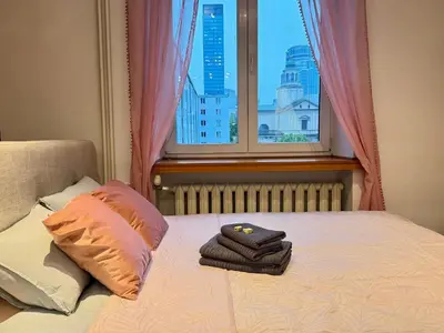 Łóżko lub łóżka w pokoju w obiekcie Warsaw City CENTER Studio Apartment