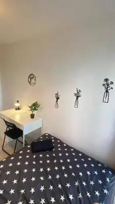 Łóżko lub łóżka w pokoju w obiekcie Rooms in Warsaw - G9