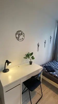 Łóżko lub łóżka w pokoju w obiekcie Rooms in Warsaw - G9