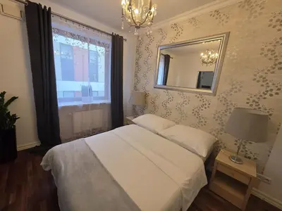 Łóżko lub łóżka w pokoju w obiekcie WB2 Wyrafinowany luksusowy apartament w centrum