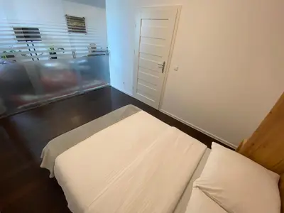 Łóżko lub łóżka w pokoju w obiekcie WB2 Wyrafinowany luksusowy apartament w centrum