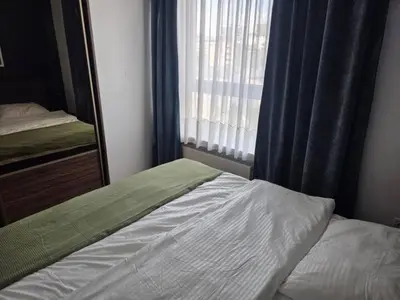 Łóżko lub łóżka w pokoju w obiekcie WB2 Wyrafinowany luksusowy apartament w centrum