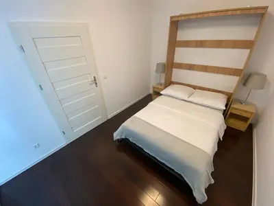 Łóżko lub łóżka w pokoju w obiekcie WB2 Wyrafinowany luksusowy apartament w centrum