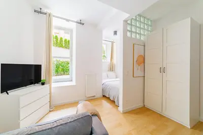 Telewizja i/lub zestaw kina domowego w obiekcie City Break Studio w Centrum Warszawy