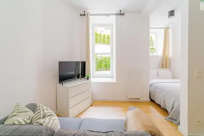 Łóżko lub łóżka w pokoju w obiekcie City Break Studio w Centrum Warszawy