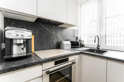 Kuchnia lub aneks kuchenny w obiekcie Jerozolimskie Premium Apartment
