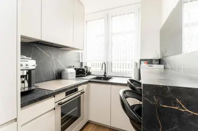 Kuchnia lub aneks kuchenny w obiekcie Jerozolimskie Premium Apartment