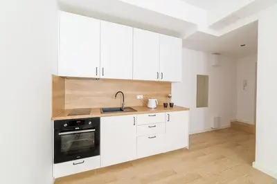 Kuchnia lub aneks kuchenny w obiekcie 2-pokojowy Apartament Centrum