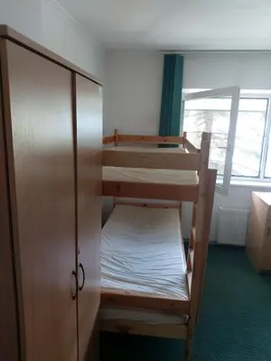 Łóżko lub łóżka w pokoju w obiekcie Wawer Hom Jelenia 4 a Wawer