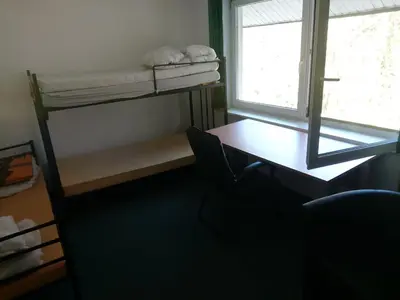 Łóżko lub łóżka w pokoju w obiekcie Wawer Hom Jelenia 4 a Wawer