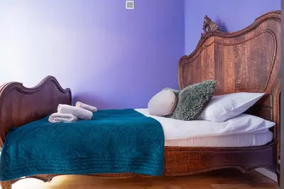 Łóżko lub łóżka w pokoju w obiekcie Pastel & Peace 2 Bedrooms Royal Lazienki