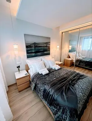 Łóżko lub łóżka w pokoju w obiekcie NiceToSeeYou Warsaw Apartament Centrum-Metro-Deluxe-self check-in