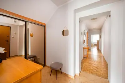 Łóżko lub łóżka w pokoju w obiekcie National Stadium Spacious Apartment by BookingHost