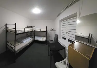 Łóżko lub łóżka w pokoju w obiekcie Hom Wawer