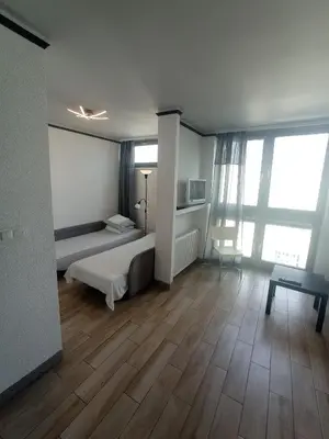 Łóżko lub łóżka w pokoju w obiekcie TopOne Apartments