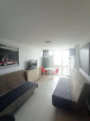 Telewizja i/lub zestaw kina domowego w obiekcie TopOne Apartments