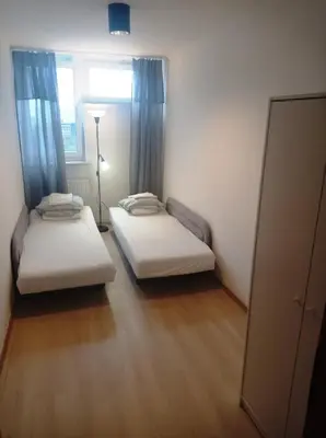 Łóżko lub łóżka w pokoju w obiekcie TopOne Apartments