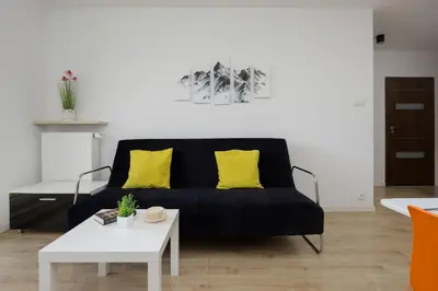 Część wypoczynkowa w obiekcie Modern Apartment in Warsaw with Underground Parking by Noclegi Renters