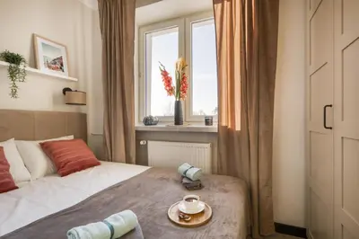 Łóżko lub łóżka w pokoju w obiekcie AirPort Pause by VAYA STAYS