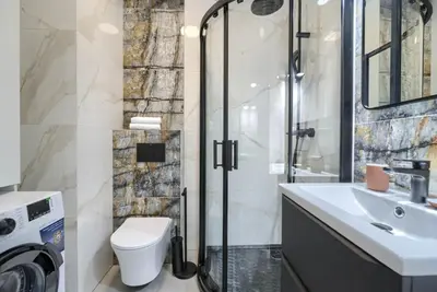 Łazienka w obiekcie Family & Business Elegant Apartments Grzybowska 37 Centrum, PARKING, Wi-Fi, Netflix