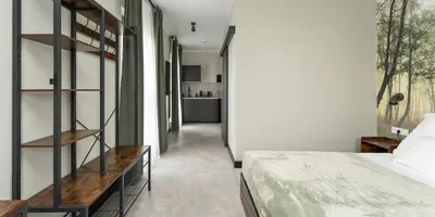 Łóżko lub łóżka w pokoju w obiekcie Praga Studio Apartments