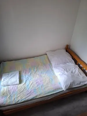 Łóżko lub łóżka w pokoju w obiekcie Ciche34m2wCentrum