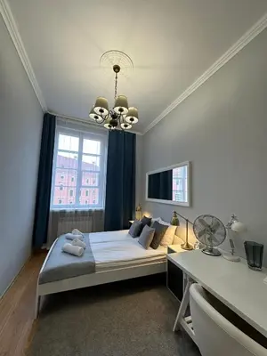 Łóżko lub łóżka w pokoju w obiekcie Apartament Warsaw Old Town Plac Zamkowy 15-19