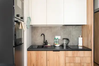 Kuchnia lub aneks kuchenny w obiekcie Ursus Deluxe Apartment by BookingHost
