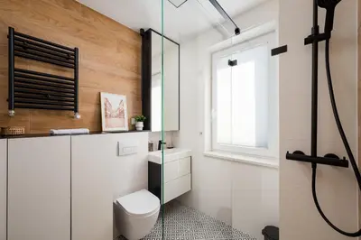 Łazienka w obiekcie Ursus Deluxe Apartment by BookingHost