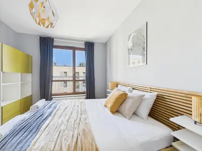 Łóżko lub łóżka w pokoju w obiekcie Dywizjonu 149A SuperApart