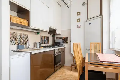 Kuchnia lub aneks kuchenny w obiekcie RentPlanet - Apartament Krajewskiego