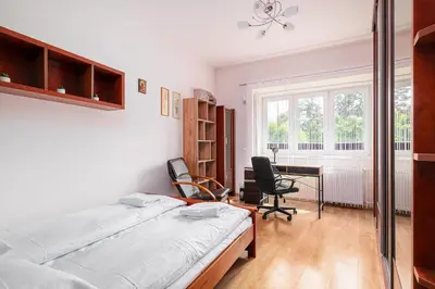 Łóżko lub łóżka w pokoju w obiekcie RentPlanet - Apartament Krajewskiego