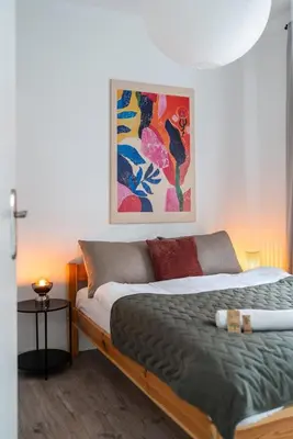 Łóżko lub łóżka w pokoju w obiekcie Warsaw Concierge Soho