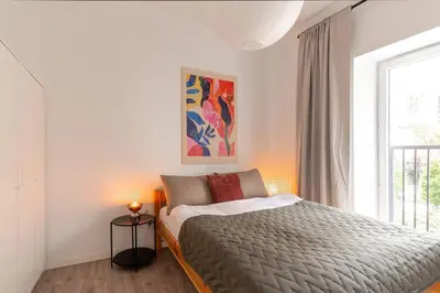 Łóżko lub łóżka w pokoju w obiekcie Warsaw Concierge Soho