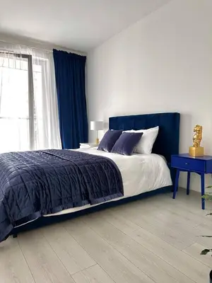 Łóżko lub łóżka w pokoju w obiekcie Apartment A12 by Real Apartment