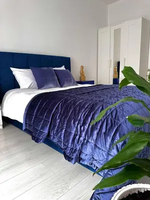Łóżko lub łóżka w pokoju w obiekcie Apartment A12 by Real Apartment