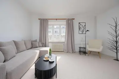Część wypoczynkowa w obiekcie Bright Apartment Mazowiecka in Warsaw Near Old Town by Noclegi Renters
