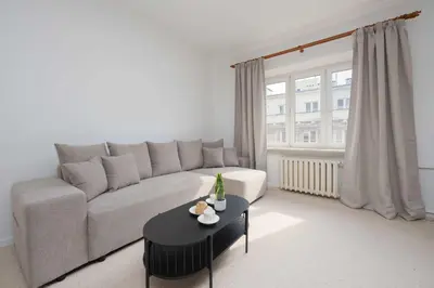 Część wypoczynkowa w obiekcie Bright Apartment Mazowiecka in Warsaw Near Old Town by Noclegi Renters
